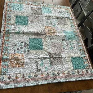 Patchwork Quilt with Teal and Gray Accents